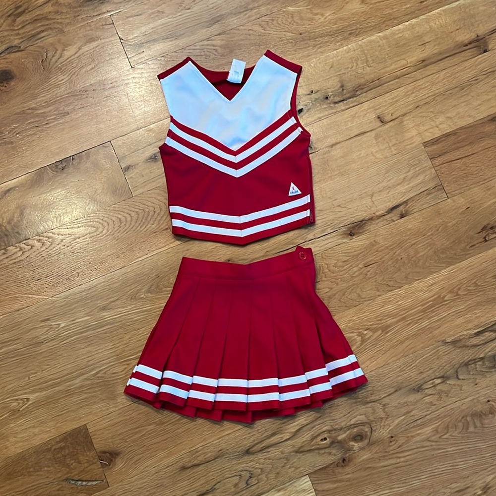 Chassé red and white cheerleading costume.